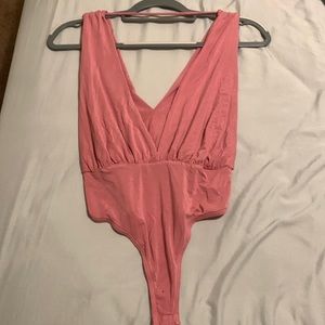 Pink bodysuit size small